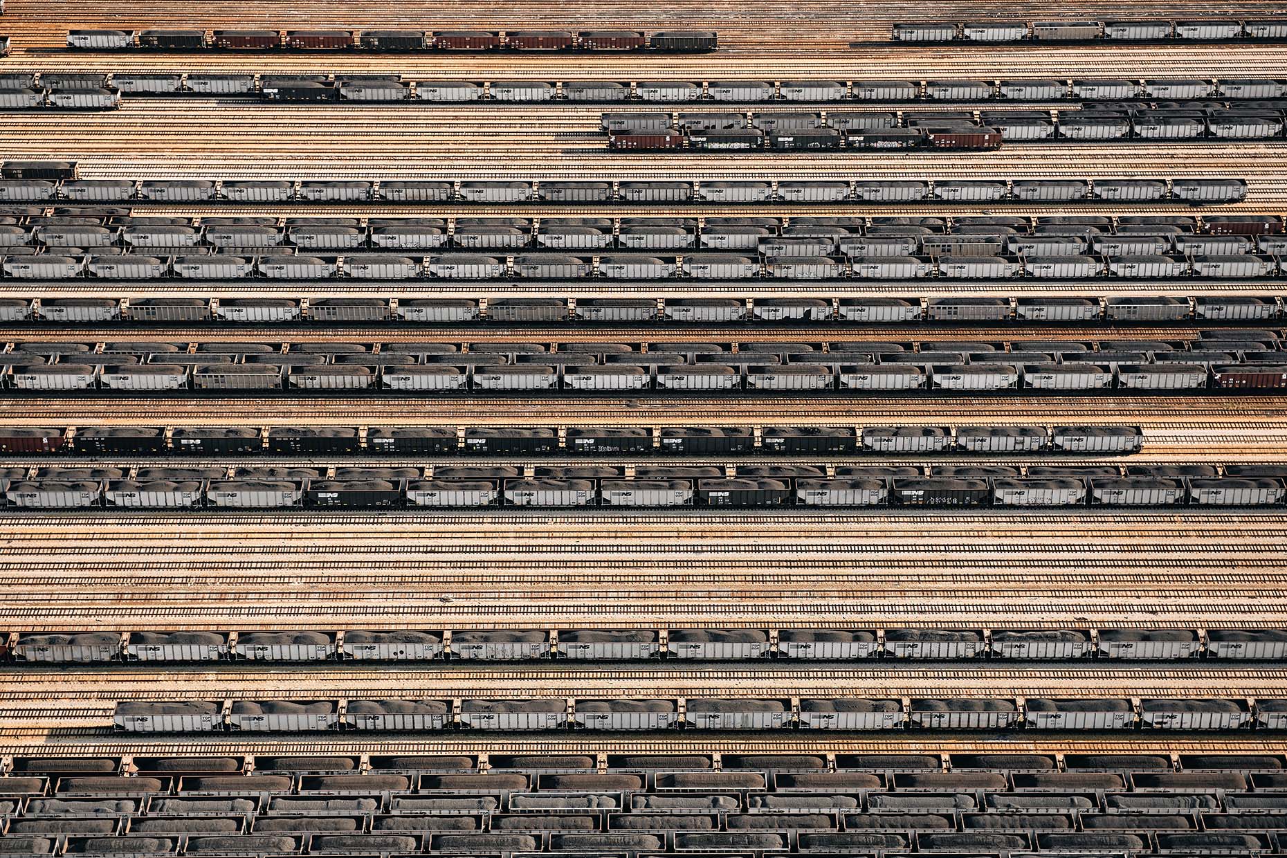 Aerial of Norfolk Southern coal trains yard along the Elizabeht River in Virginia.